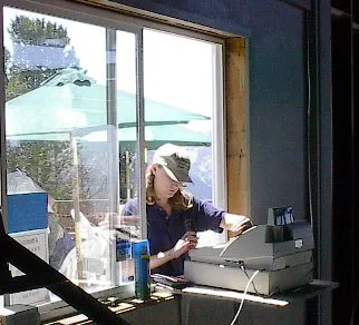 amy a person standing in front of a window